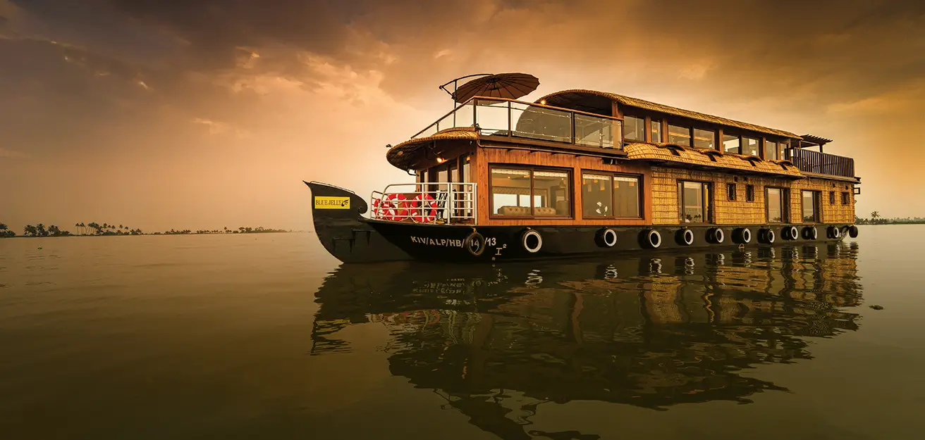 Alleppey houseboat backwaters Kerala sunset